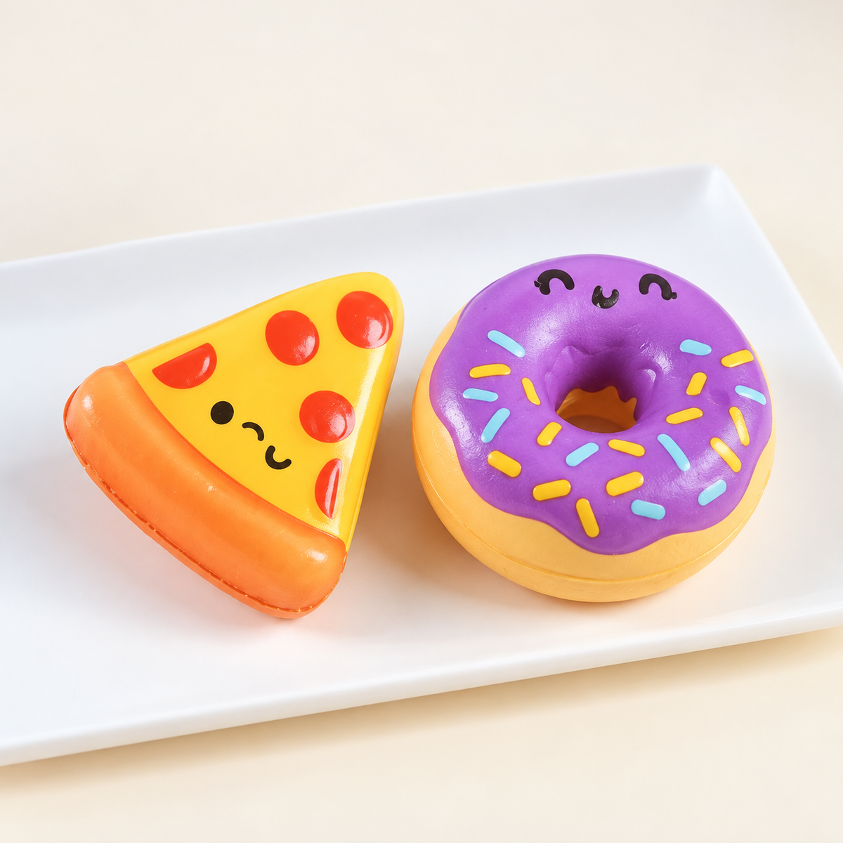 AI-styled purple donut and pizza squishy toy view; designs are illustrative